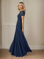 Robe en mousseline de soie bleu marine foncé, coupe trapèze, col bateau et sequins 