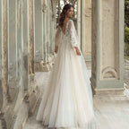 Vestido de novia elegante corte A, manga abullonada, espalda descubierta, apliques de cuentas, escote en V.