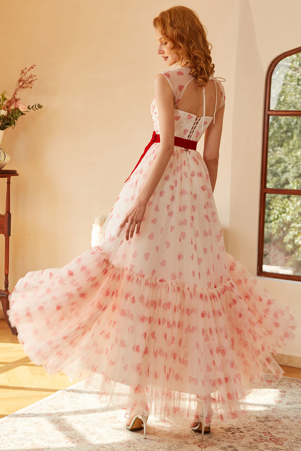 Robe de bal longue princesse trapèze décolleté cœur avec nœud papillon