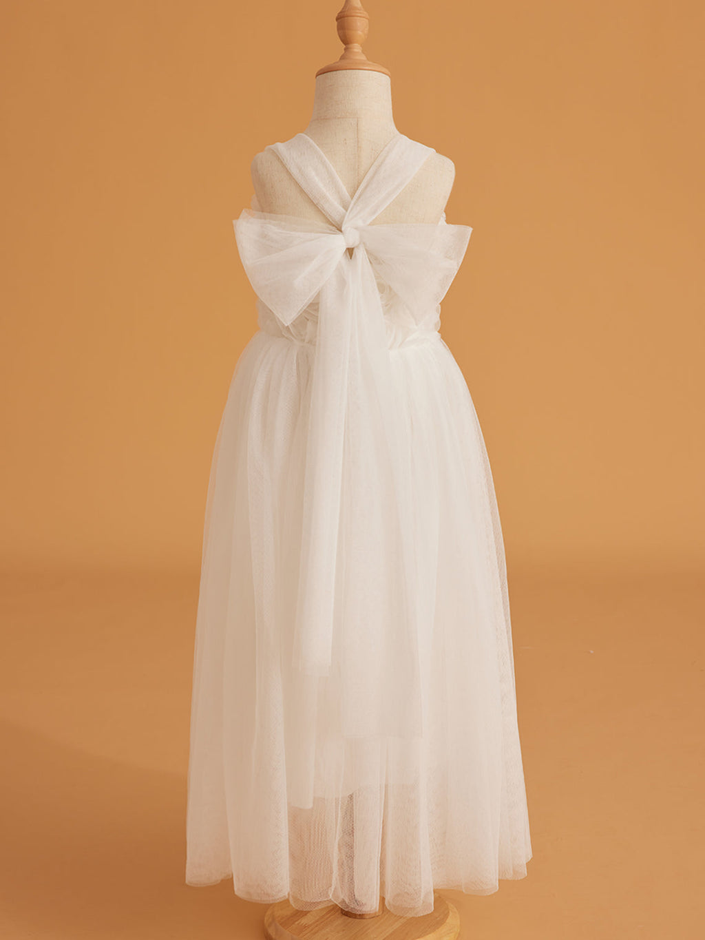 Vestido de bebé niña con lazo de tul y aplique floral en 3D de la colección Jardín Encantado 