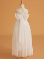 Vestido de bebé niña con lazo de tul y aplique floral en 3D de la colección Jardín Encantado 