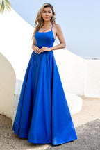 Robe de bal dos nu en satin bleu royal