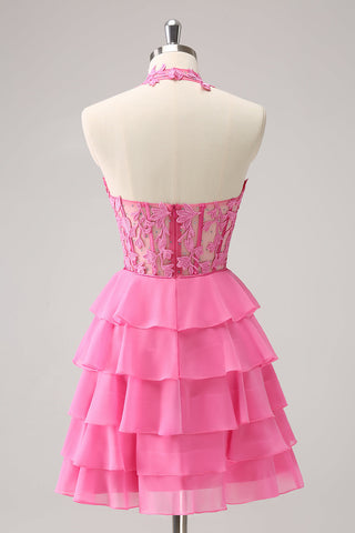 Robe de bal rose fuchsia ravissante, coupe trapèze, bustier à volants et perles