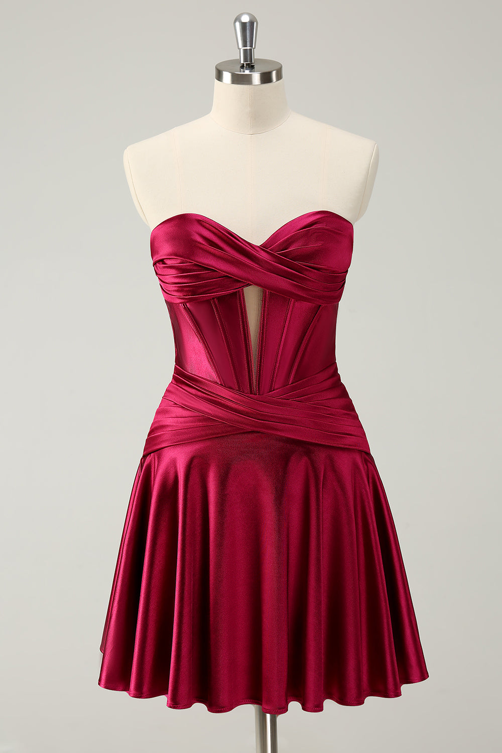 Vestido de fiesta fucsia de moda con escote corazón, corte en A y corsé de satén.