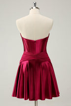 Robe de bal tendance fuchsia à bustier cœur en satin et corset trapèze