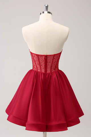 Robe de bal rouge mignonne, bustier, coupe trapèze, à volants et perles