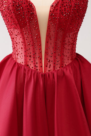 Robe de bal rouge mignonne, coupe trapèze, bustier, corset à volants et perles