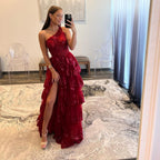 Vestido largo de fiesta de encaje con un solo hombro y volantes
