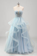 Robe de bal longue à corset en tulle à volants et sequins en forme de cœur, coupe trapèze, bustier à volants, ornée de sequins et d'un décolleté en cœur