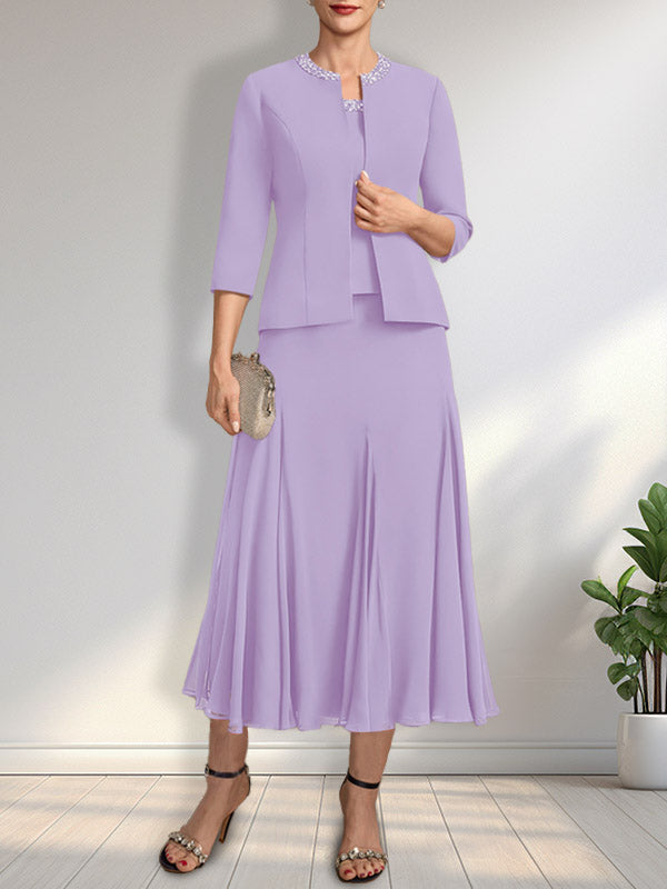 Vestido de novia de gasa, corte línea A, escote redondo, largo té, con lentejuelas y pedrería. 