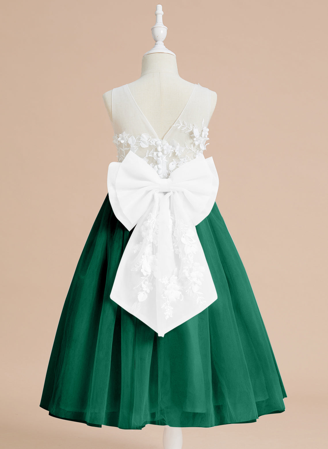 Vestido midi de encaje floral y lazo grande 