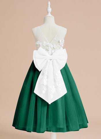 Vestido midi de encaje floral y lazo grande 