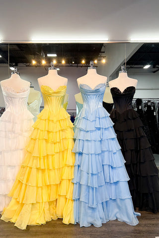 Vestido de fiesta largo de gasa con escote corazón, corte en A, volantes y corsé, con abertura