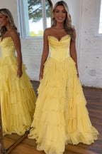 Vestido de fiesta largo de gasa con escote corazón, corte en A, volantes y corsé, con abertura