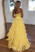 Vestido de fiesta largo de gasa con escote corazón, corte en A, volantes y corsé, con abertura