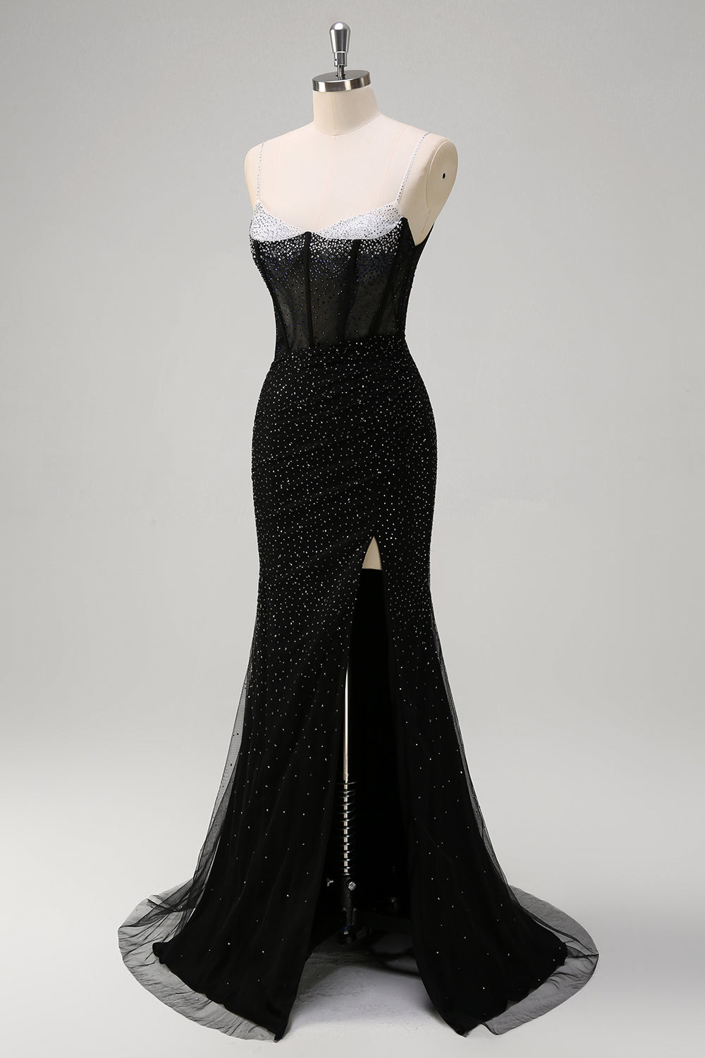 Robe de bal longue sirène à bretelles spaghetti, ornée de perles et fendue, bleu roi pailleté. Entièrement à paillettes et fendue.