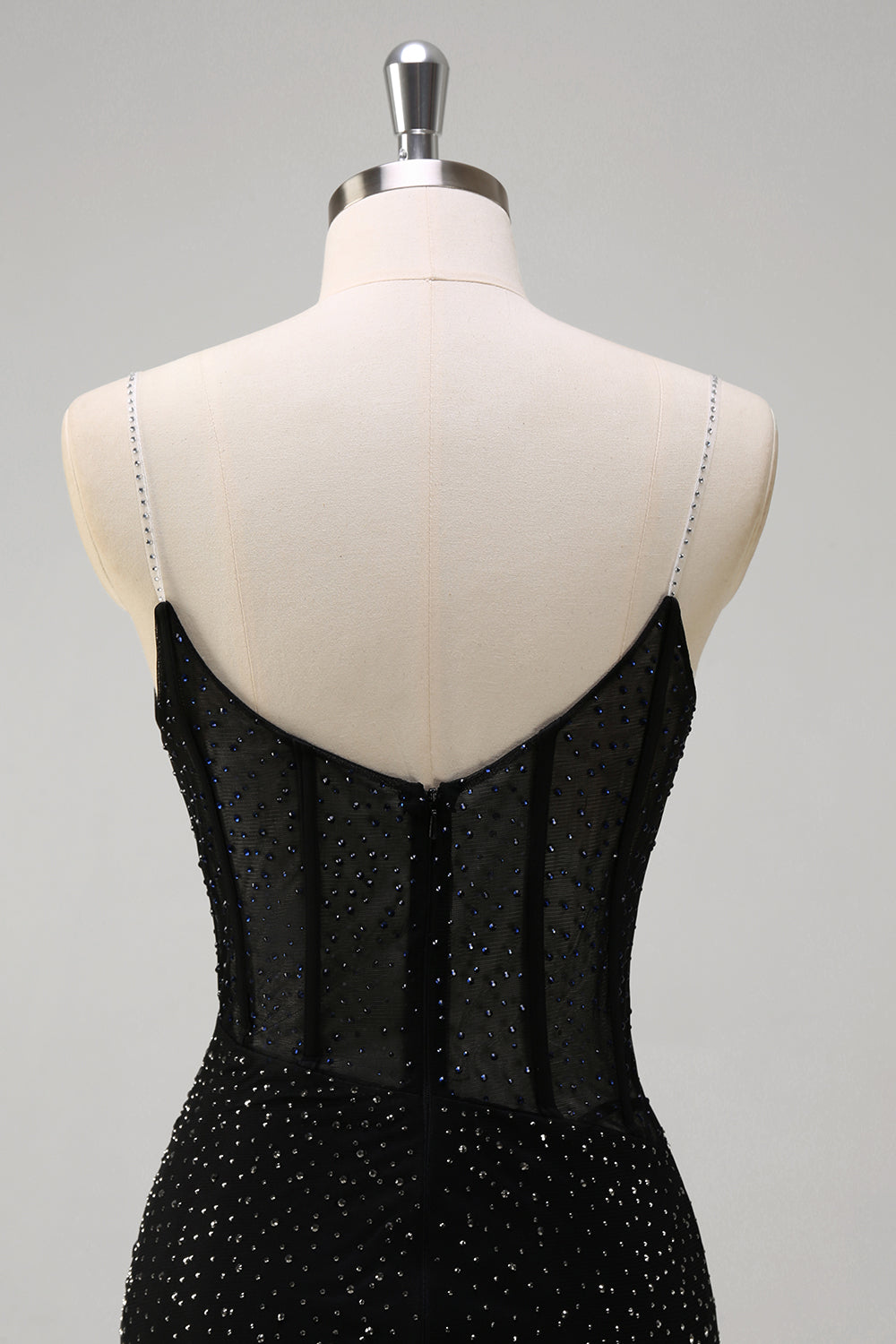 Robe de bal longue sirène à bretelles spaghetti, ornée de perles et fendue, bleu roi pailleté. Entièrement à paillettes et fendue.