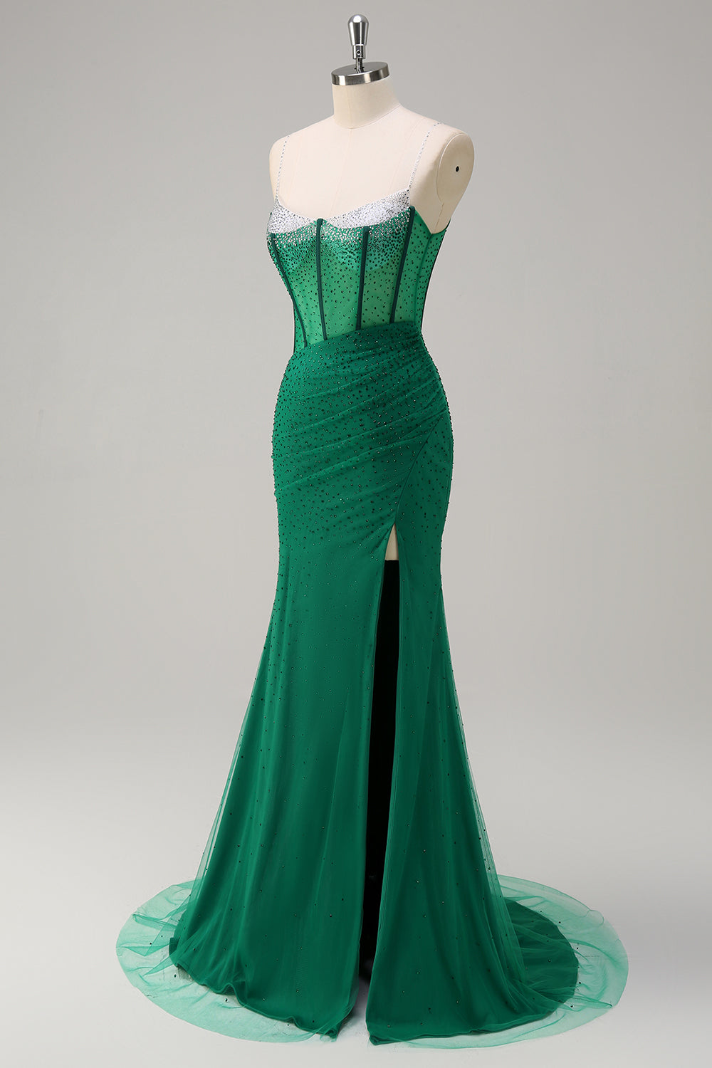 Robe de bal longue sirène à bretelles spaghetti, ornée de perles et fendue, bleu roi pailleté. Entièrement à paillettes et fendue.