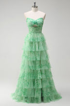 Robe de bal longue en mousseline de tulle vert à imprimé floral, coupe trapèze, avec fente.