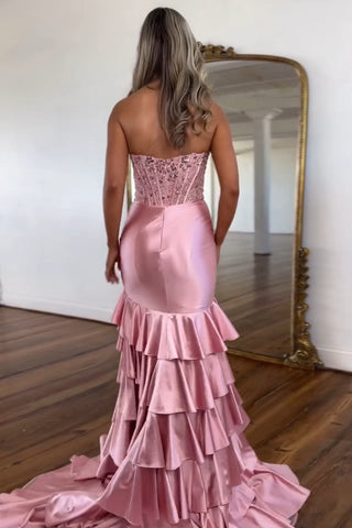 Robe de bal longue sirène bustier en satin rose poudré à volants et sequins