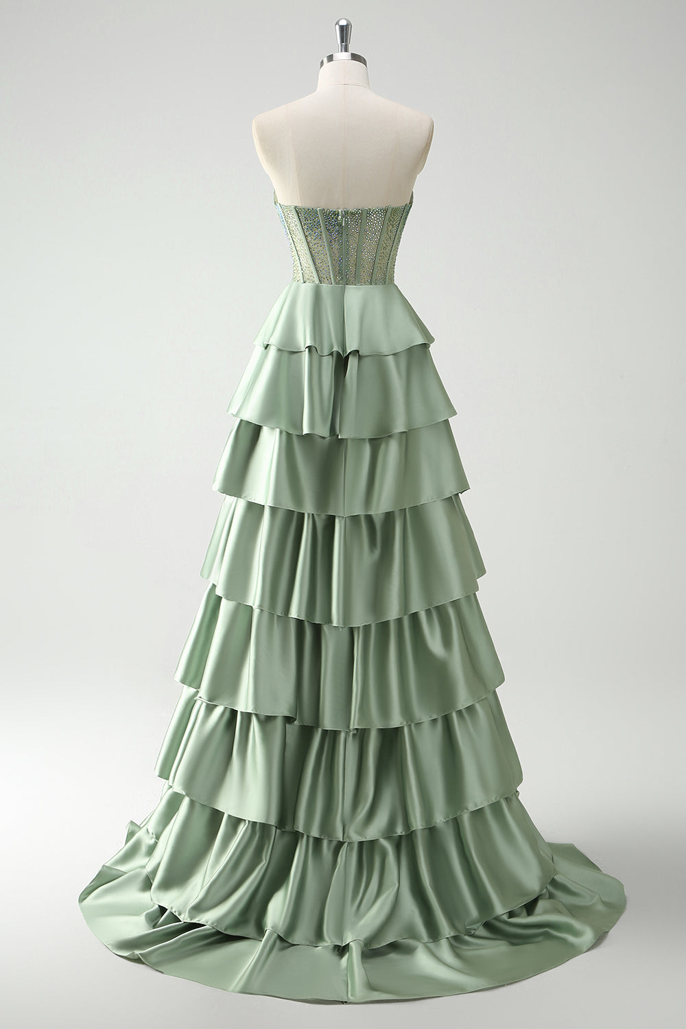 Robe de bal longue vert pailleté coupe trapèze à corset à volants