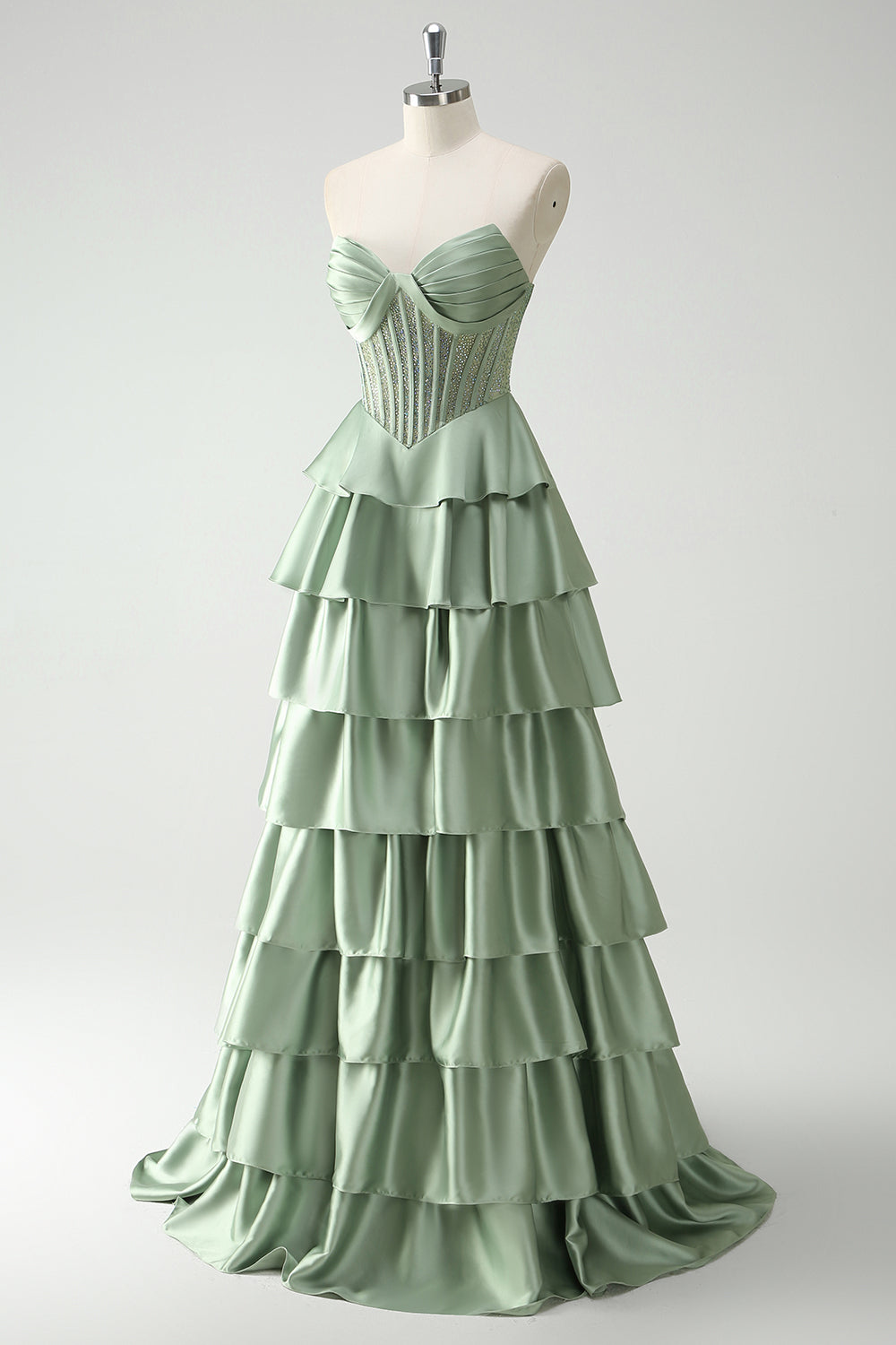 Robe de bal longue vert pailleté coupe trapèze à corset à volants