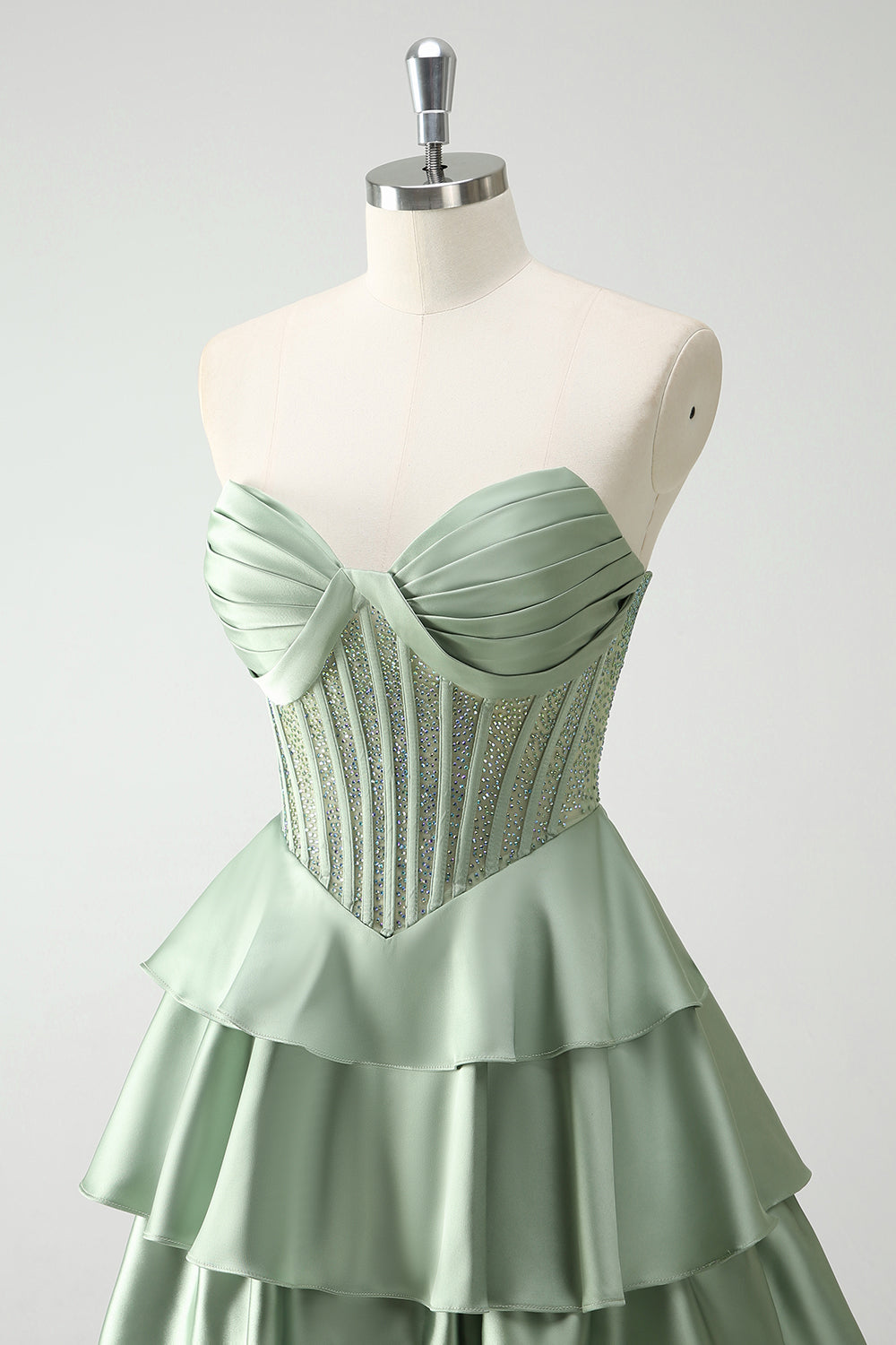 Robe de bal longue vert pailleté coupe trapèze à corset à volants