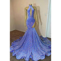 Vestido de fiesta glamuroso y dramático de corte sirena, sin mangas, con volantes y cuello alto