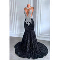 Vestido de noche de sirena con escote en V profundo, sin mangas, lentejuelas y volantes glamurosos y dramáticos