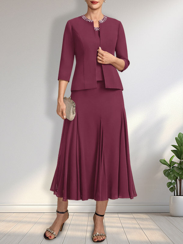 Vestido de novia de gasa, corte línea A, escote redondo, largo té, con lentejuelas y pedrería. 