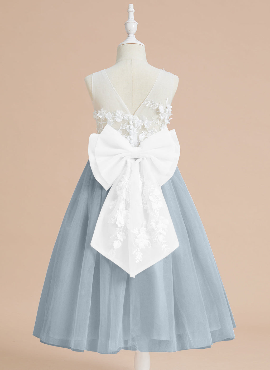 Vestido midi de encaje floral y lazo grande 