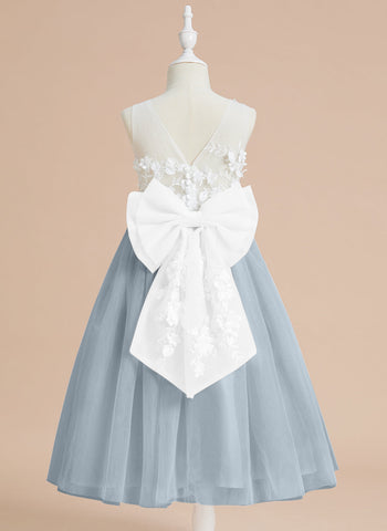 Vestido midi de encaje floral y lazo grande 