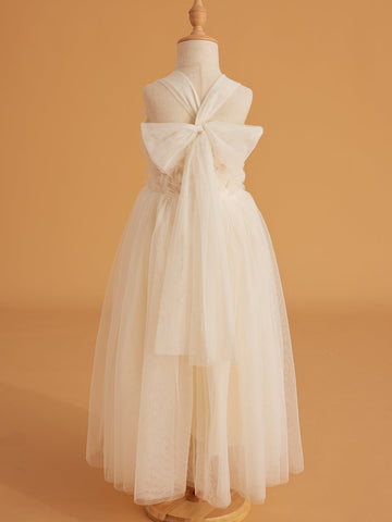 Vestido de bebé niña con lazo de tul y aplique floral en 3D de la colección Jardín Encantado 