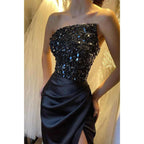 Robe de soirée longue noire sans bretelles avec haut à paillettes et fente 