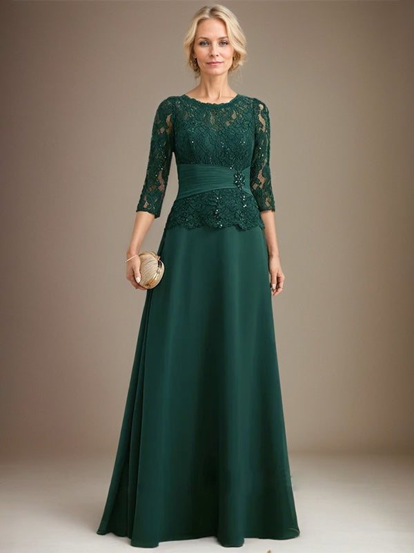 Vestido de corte A, escote ilusión, largo hasta el suelo, de gasa y encaje, para la madre de la novia, con lentejuelas plisadas y pedrería. 