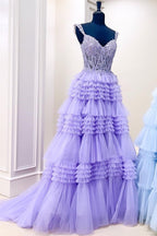 Robe de bal longue en tulle à épaules dénudées et à volants étagés
