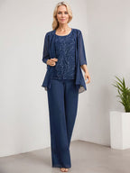 Vestido de novia de gasa con encaje y lentejuelas, estilo mono/pantalón, largo hasta el suelo, con escote redondo.