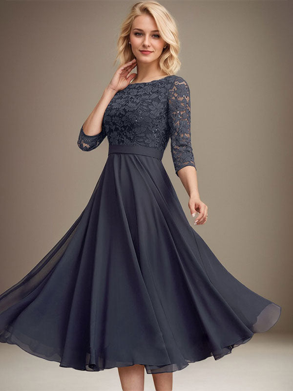 Vestido de novia de corte línea A, escote redondo, largo hasta la rodilla, de encaje y gasa con lentejuelas.