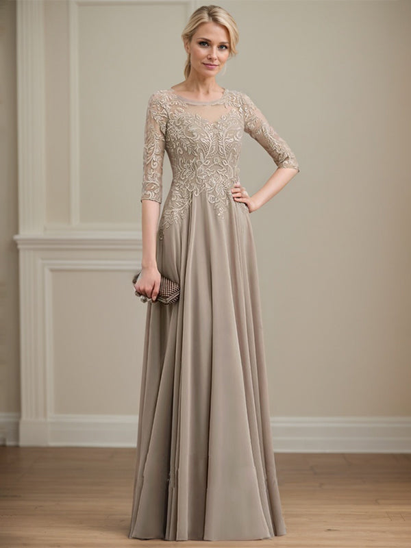 Vestido de novia de corte A, escote redondo, ilusión, largo hasta el suelo, de encaje y gasa con lentejuelas. 