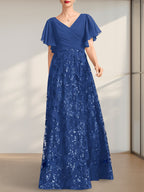 Vestido de novia de corte A, escote en V, largo hasta el suelo, de encaje, lentejuelas y gasa, con pliegues.