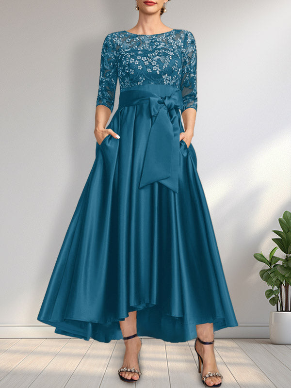 Vestido de madrina de la novia, corte asimétrico, escote ilusión, satén y encaje, con lazo.