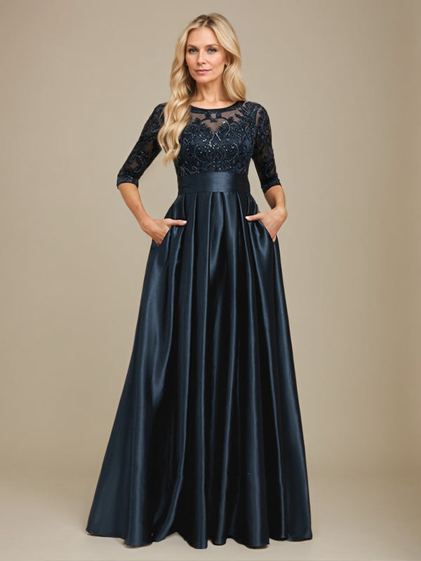 Vestido de madrina de la novia, corte en A, escote ilusión, largo hasta el suelo, satén elástico con encaje y lazo de lentejuelas. 