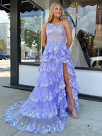 Vestido largo de fiesta de encaje con un solo hombro y volantes
