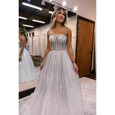 Robe de soirée longue trapèze en tulle à bretelles spaghetti scintillantes et paillettes