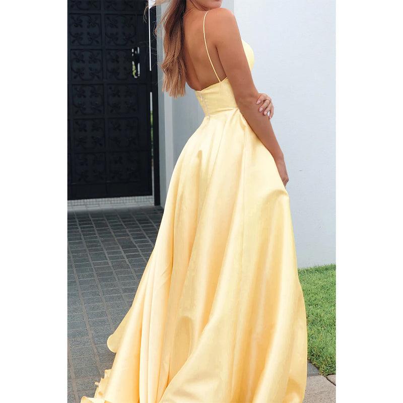 Vestido de fiesta de satén amarillo con escote en V pronunciado y bolsillos 