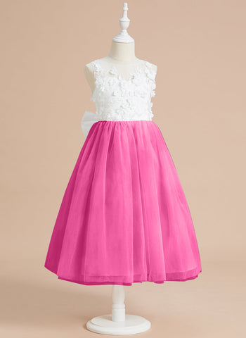 Vestido midi de encaje floral y lazo grande 