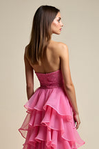 Robe de bal longue corail à décolleté en A et volants