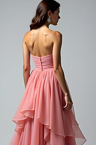 Robe de bal longue bustier froncée rose poudré à volants