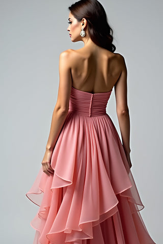 Robe de bal longue bustier froncée rose poudré à volants