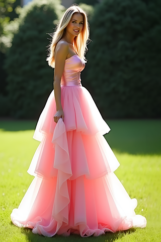 Robe de bal longue rose trapèze à décolleté cœur et volants